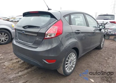 2016 Ford Fiesta Titanium z USA, uszkodzony, nr VIN 3FADP4FJXGM130417